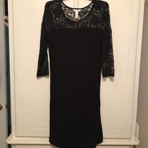 Maternity black lace dress.